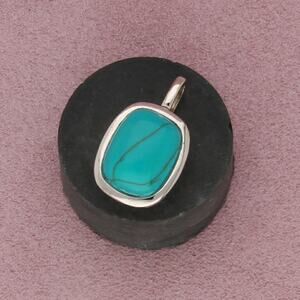 sterling silver bezel-set turquoise pendant